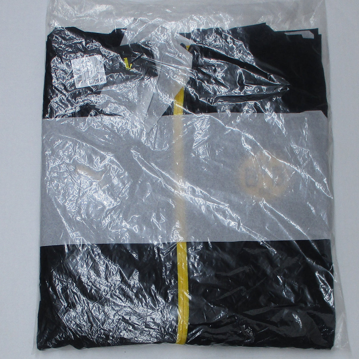 Offizielle Puma Borussia Dortmund Woven Trainingsjacke der Saison 2025/26 für Herren in Schwarz-Gelb mit aufgummiertem BVB-Vereinswappen und windCELL-Technologie – Neu mit Etikett. Originalverpackung.