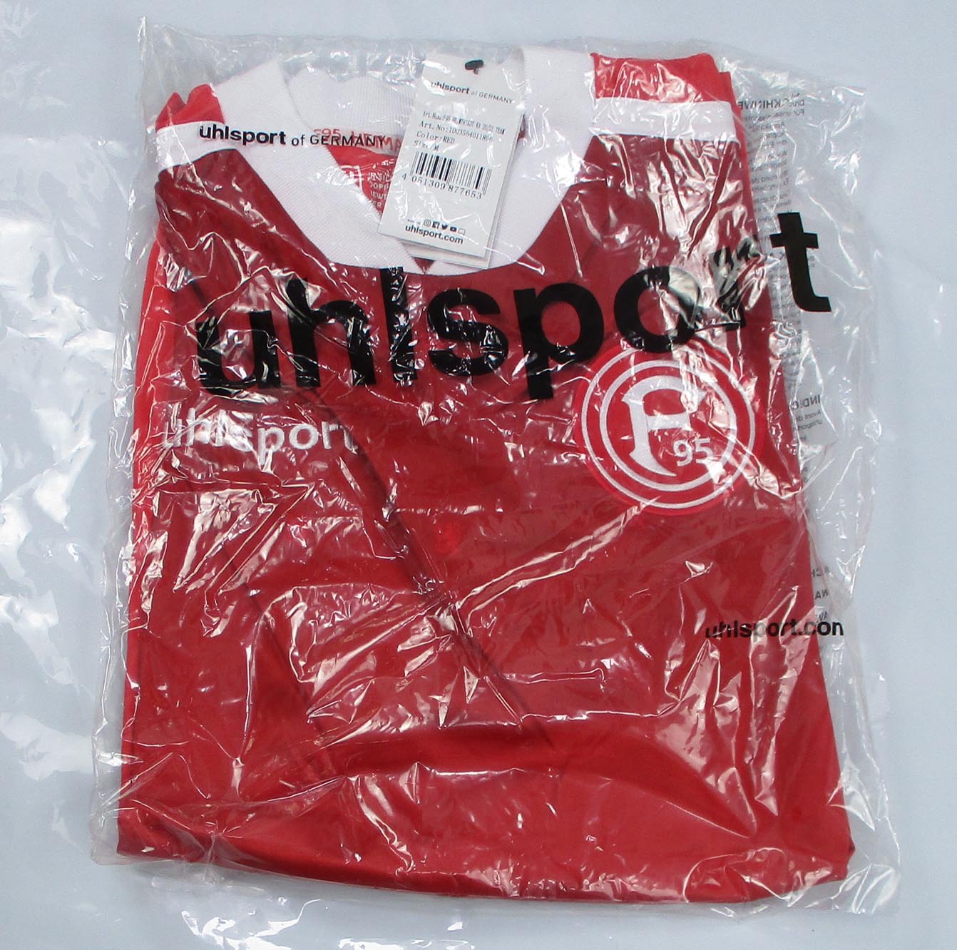 Rotes Fortuna Düsseldorf Heimtrikot 2020/21 von Uhlsport als reduziertes Angebot günstig kaufen. Spielerversion ohne Brustsponsor.  Originalverpackung.
