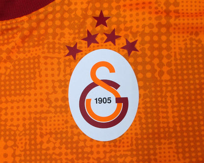 Puma Galatasaray Istanbul Trainingstrikot 2024/25 in Intense Orange ohne Sponsor. Vereinswappen.