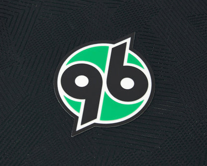Hannover 96 Trikot Away 2026 2027 Macron Herren rot geprägte Wahrzeichen Eco Softlock neu mit Etikett. Detailansicht Vereinswappen.