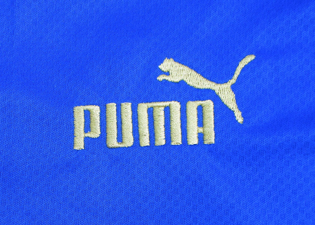 Italien Trikot Home 2022/23 Puma -  originales Heimtrikot der italienischen Fußballnationalmannschaft mit eingesticktem Wappen.  Puma Herstellerlogo.