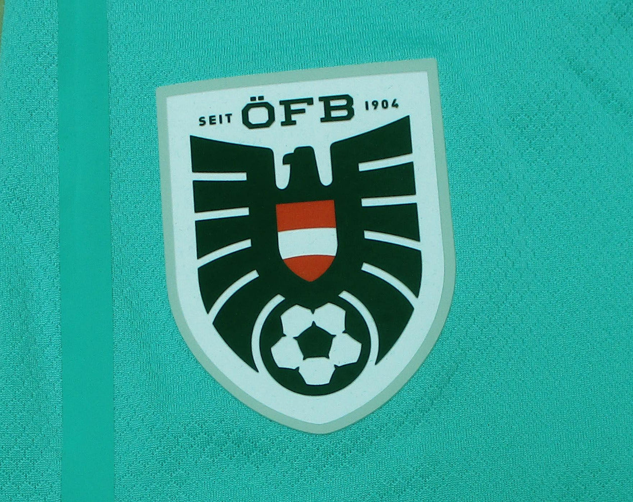 Österreich Nationalmannschaft Player Shorts Türkis 2019 2020 Puma Damen Fußballshorts Original Neu. Detailansicht Verbandswappen ÖFB.